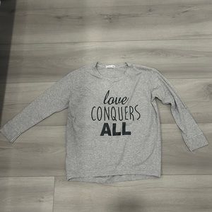 “Love conquers all” Long Sleeve